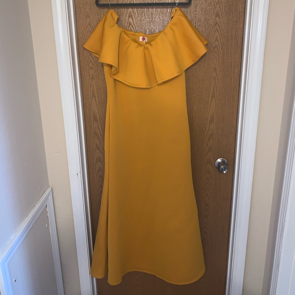 A mustard color dress
